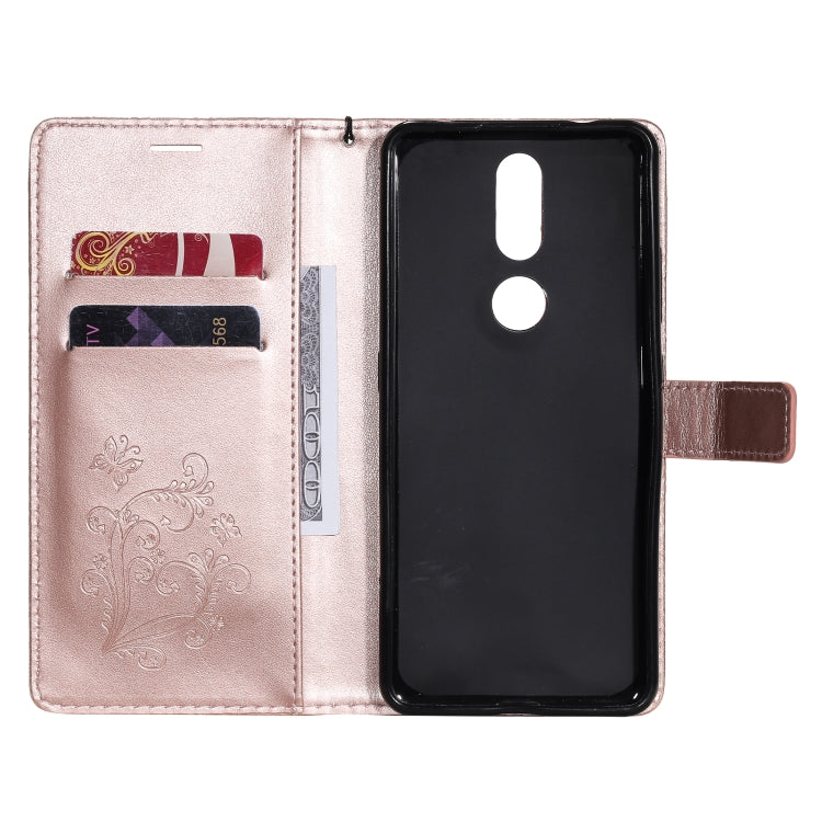 Para Nokia 2.4 3D Mariposas en relieve Patrón Funda de cuero con tapa horizontal con soporte, ranura para tarjeta y billetera (oro rosa)