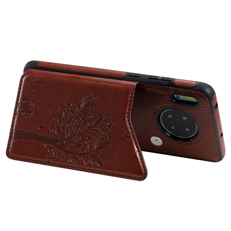 Funda protectora a prueba de golpes con patrón de relieve de árbol de gato Huawei Mate 30 con ranuras para tarjetas y marco de fotos (marrón)