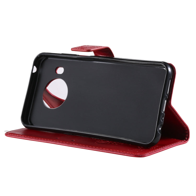 Para NOKIA X10 Árbol y gato Patrón de impresión prensada Funda de cuero PU de la PU con soporte y ranuras para tarjetas y cordón (rojo)
