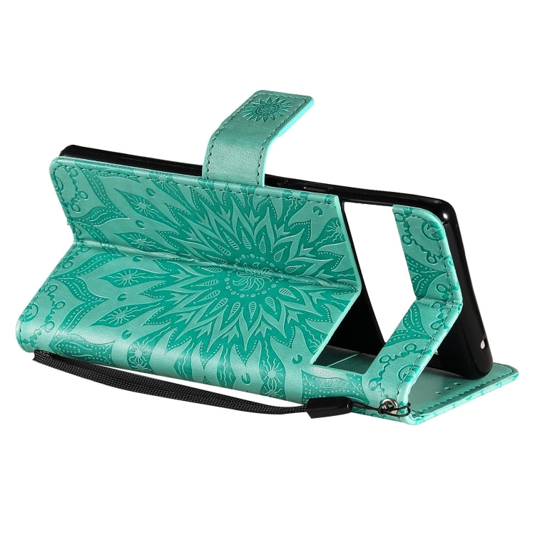 Para Google Pixel 6 Sun Pattern Horizontal Flip Funda de cuero con ranura para tarjeta y soporte y billetera y cordón (verde)
