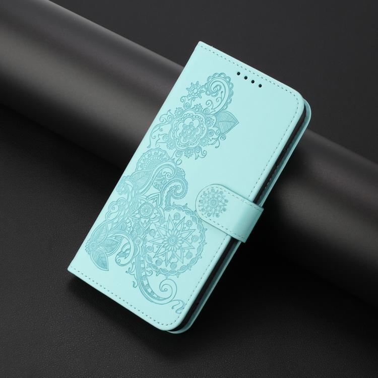 Funda de Cuero con Tapa con Relieve Flor de Datura para Huawei Nova 12 Pro/Nova 12 Ultra (Azul Claro)