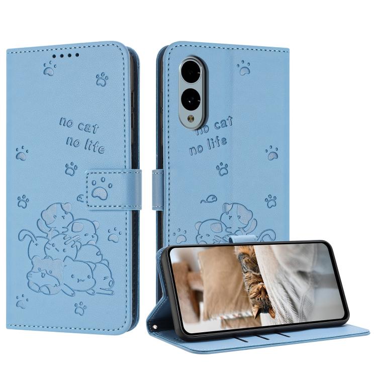 Funda de Cuero Fujitsu Arrows We2 Plus F-51E con Diseño de Gatito En Relieve y Cordón (Azul)