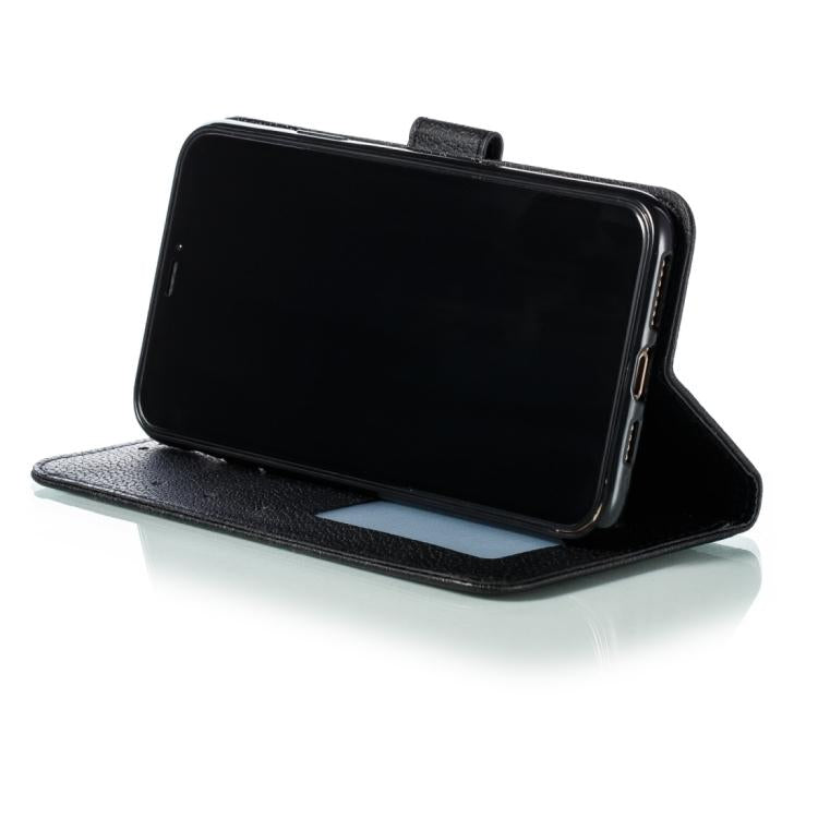 Funda de cuero con textura de lichi y estampado de plumas para Samsung Galaxy XCover7 Pro (negra)