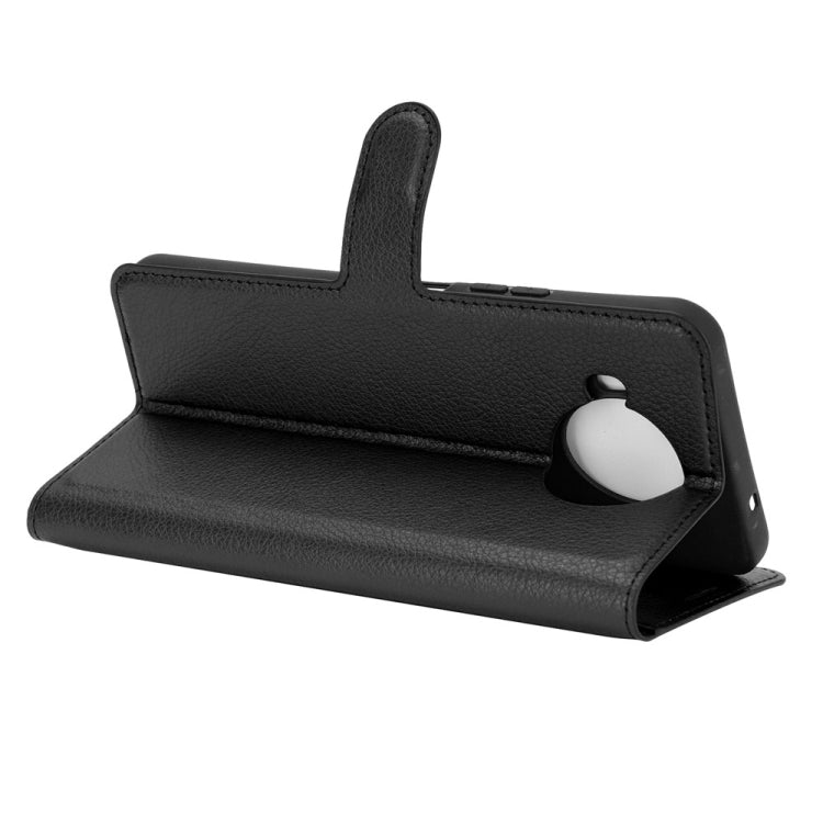 Para Nokia 8.3 5G Litchi Texture Funda protectora con tapa horizontal con soporte, ranuras para tarjetas y billetera (negro)