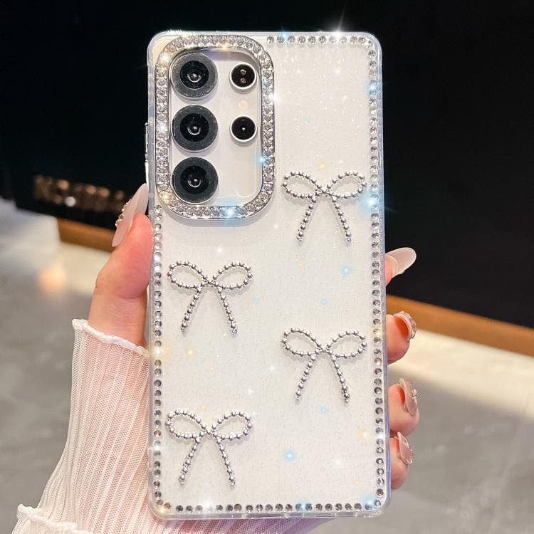 Funda antigolpes con lazo de cuatro esquinas y purpurina de diamante para Samsung Galaxy S25 5G (blanca)
